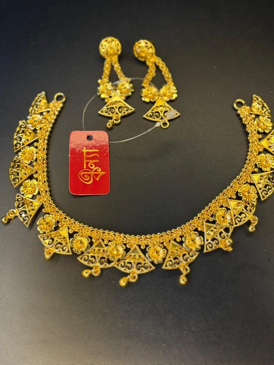 Tribhuj necklace
