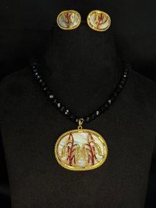 Dhaner sish shell pendant