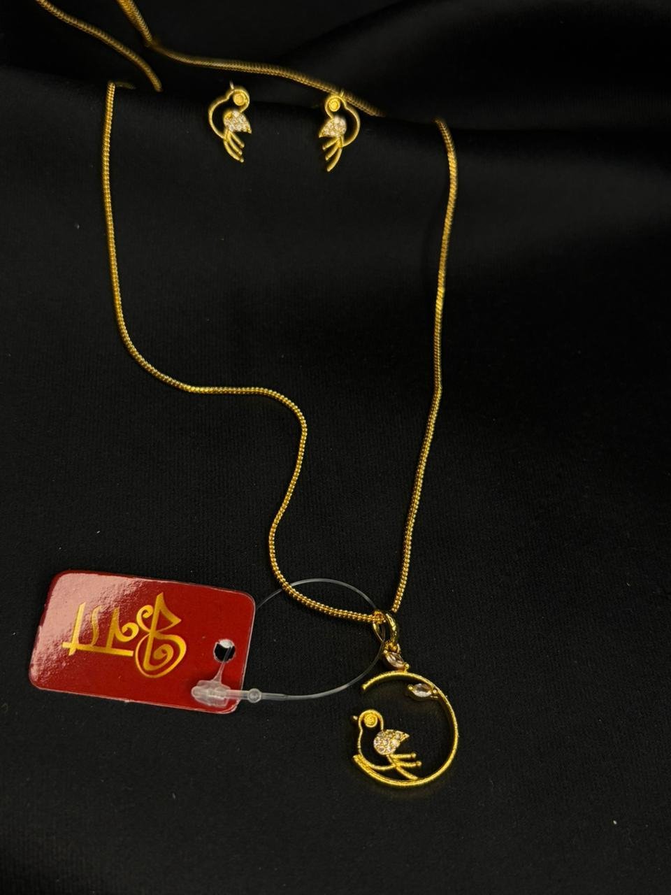 Moon bird pendant