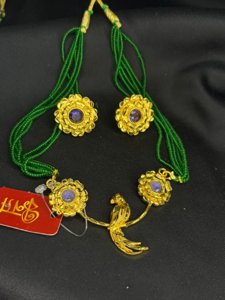 Kusumika pakhi pendant